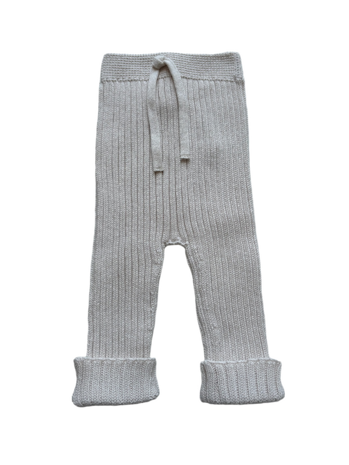 Knitted baby pants in creme color 