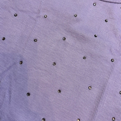 Picture features the stud detailing on the light purple top from Flowers by Zoe