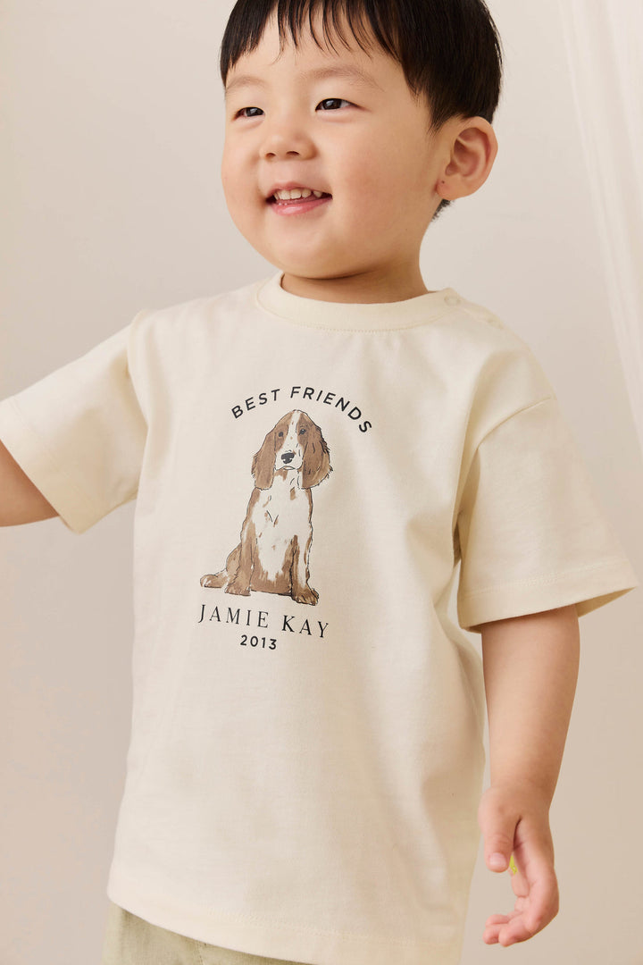 Child wearing a 'Best Friends' t-shirt with a dog illustration and 'Jamie Kay' branding.
