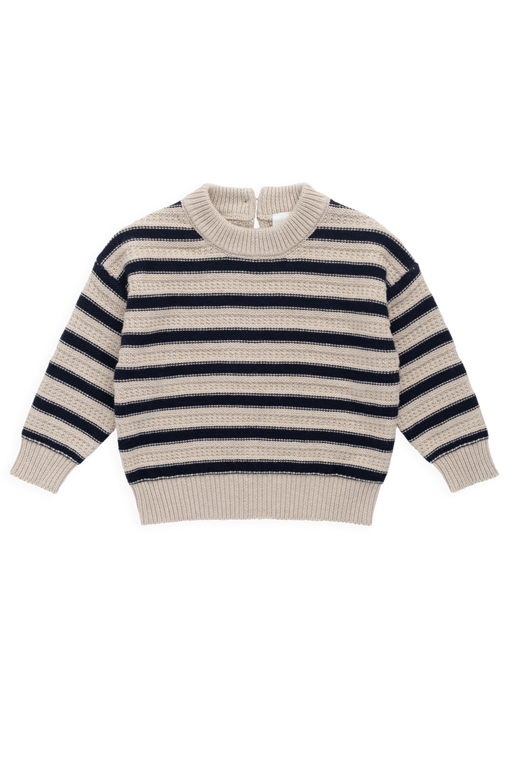 Striped sweater with navy and beige pattern on a white background