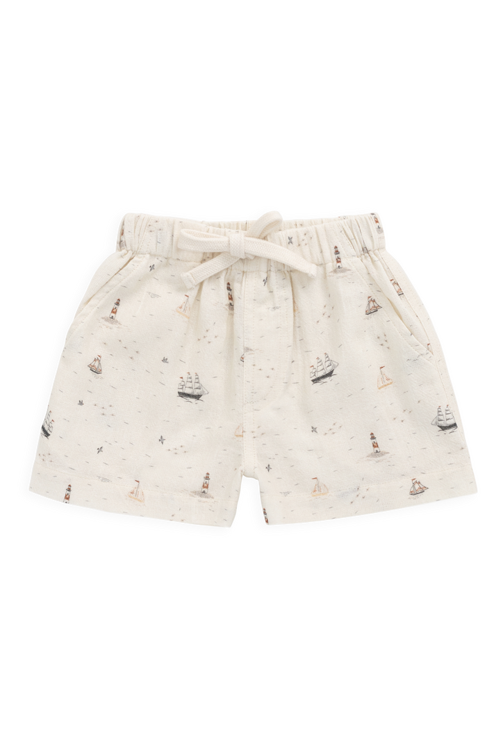 Shorts with sailboat pattern on a white background