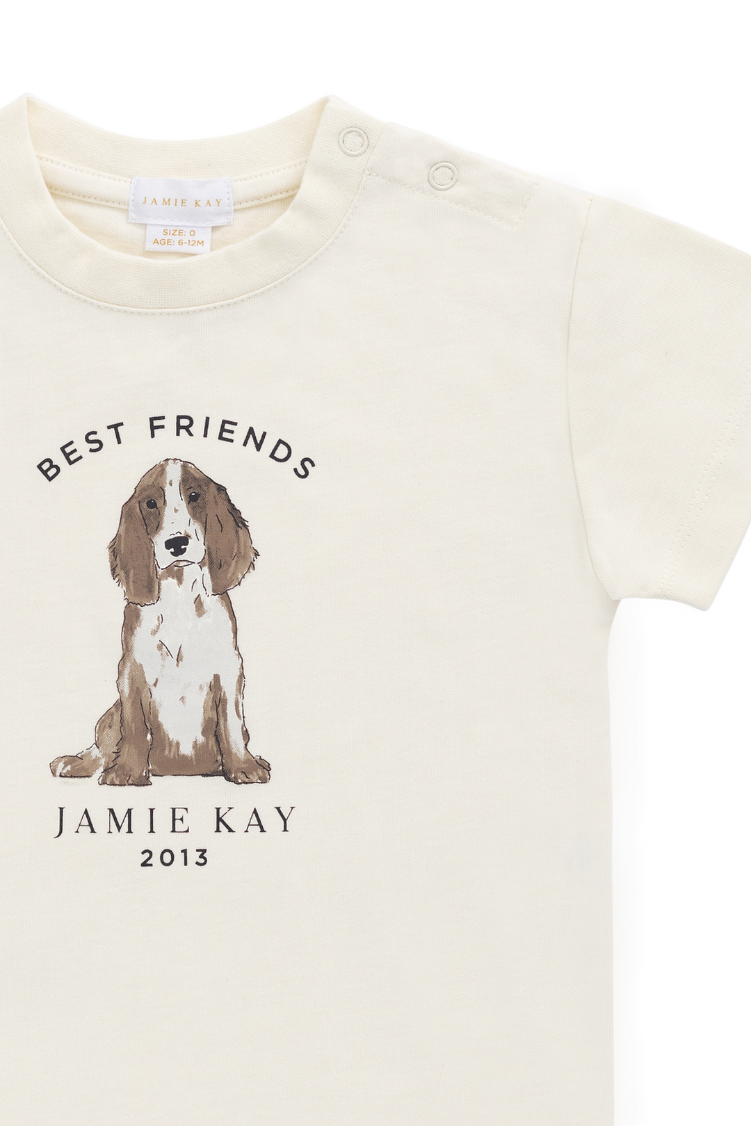 Baby onesie with a dog illustration and text on a white background
