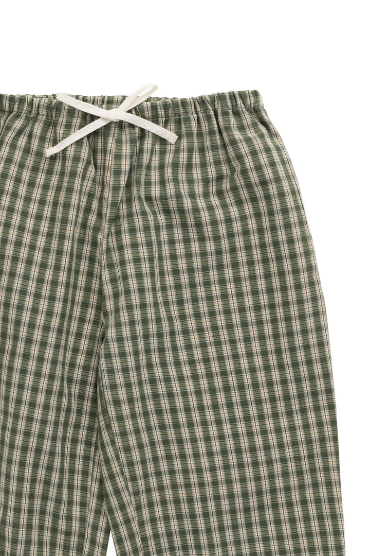 Green and beige checkered pants with a white drawstring on a white background
