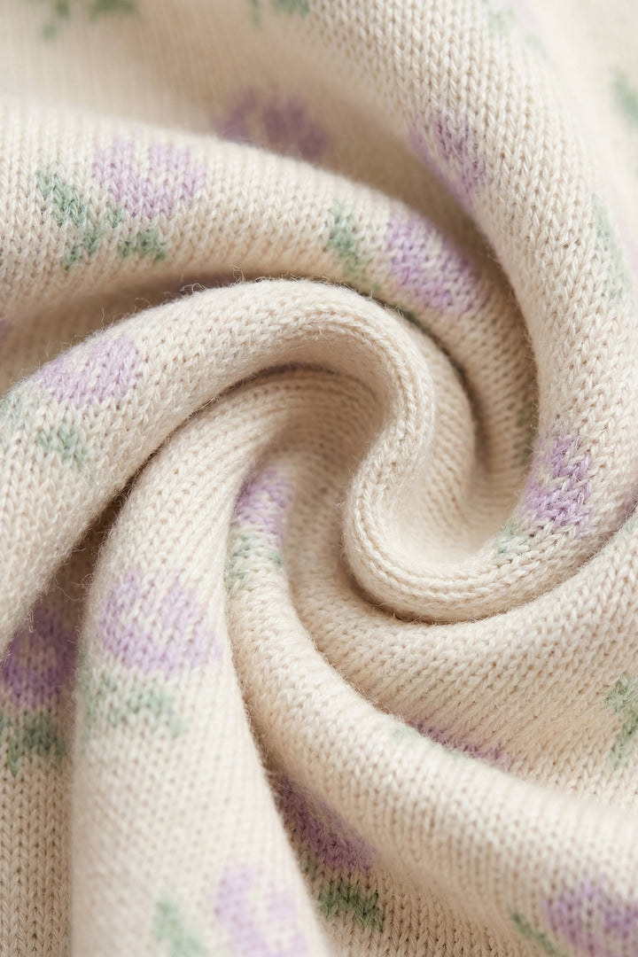 Close-up of textured fabric with subtle floral pattern
