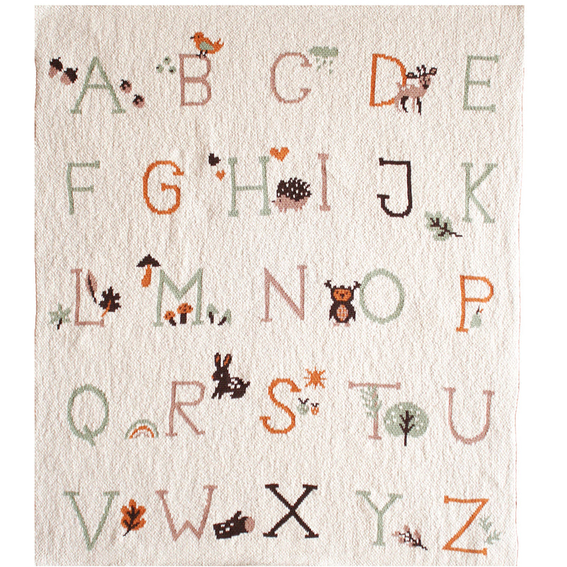 beige blanket with little woodland characters all over the blanket. main theme of blanket is the alphabet. 