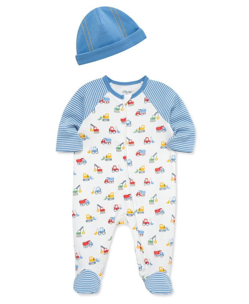 Baby onesie with vehicle print and matching hat on a white background