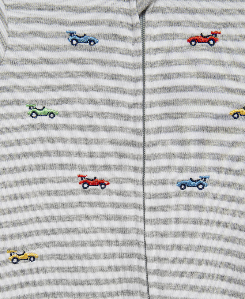 Striped fabric with embroidered toy cars on a gray background