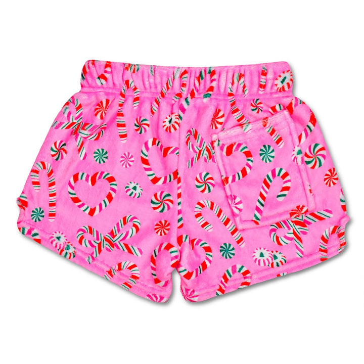 Pink plush shorts with candy cane pattern on a white background