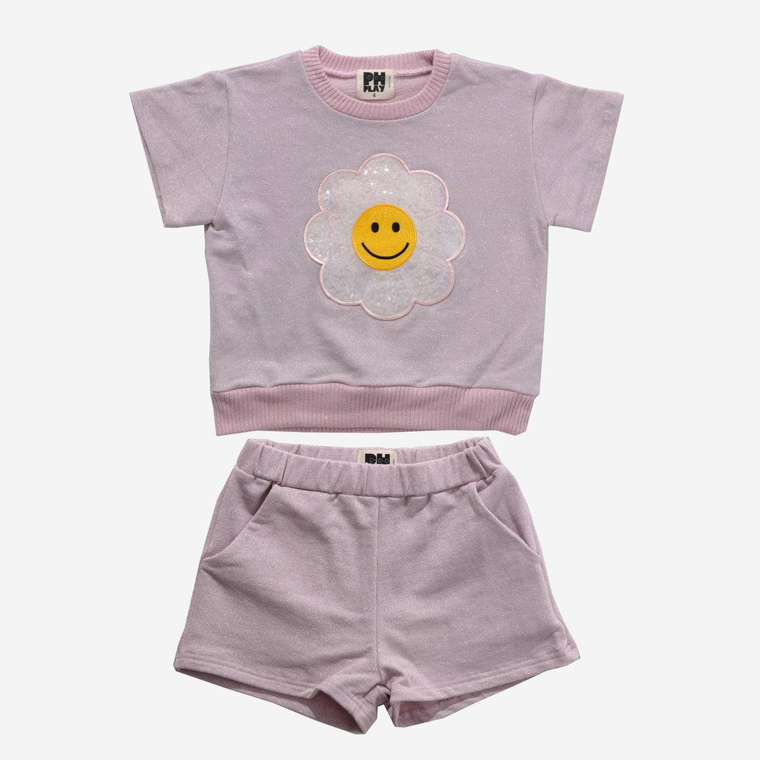 pink metallic outfit with short sleeve top and daisy sequin applique and pink metallic elastic waisted shorts. 