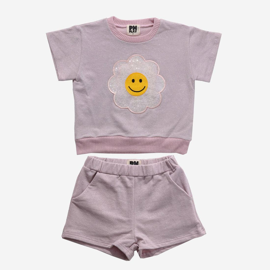 pink metallic outfit with short sleeve top and daisy sequin applique and pink metallic elastic waisted shorts. 