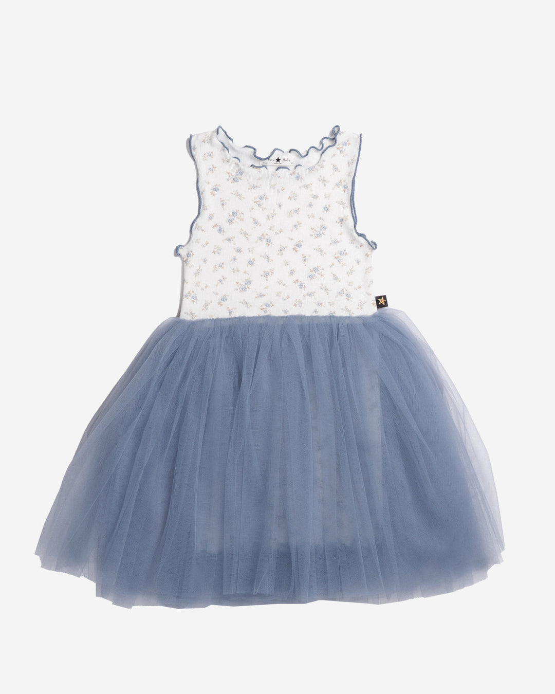 Children's dress with white top and blue tulle skirt on a white background