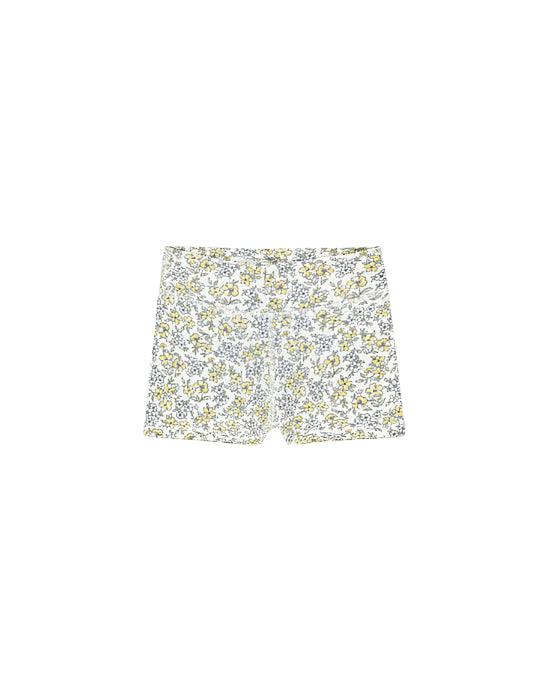 spandex shorts with a pastel floral pattern in yellow and blue flowers. 