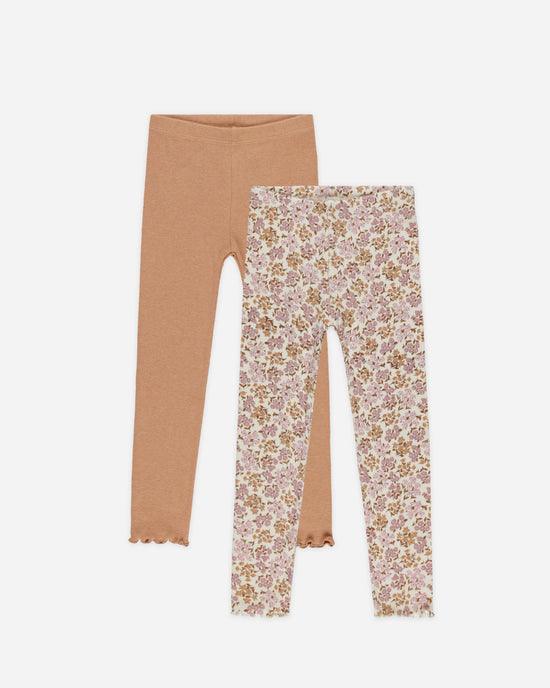 set of ribbed leggings one in grapefruit and one in pastel floral. each with lettuce edge at the bottom of leggings. 