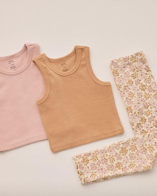 this picture shows a ribbed tank set in grapefruit and pink with the pastel floral leggings. 