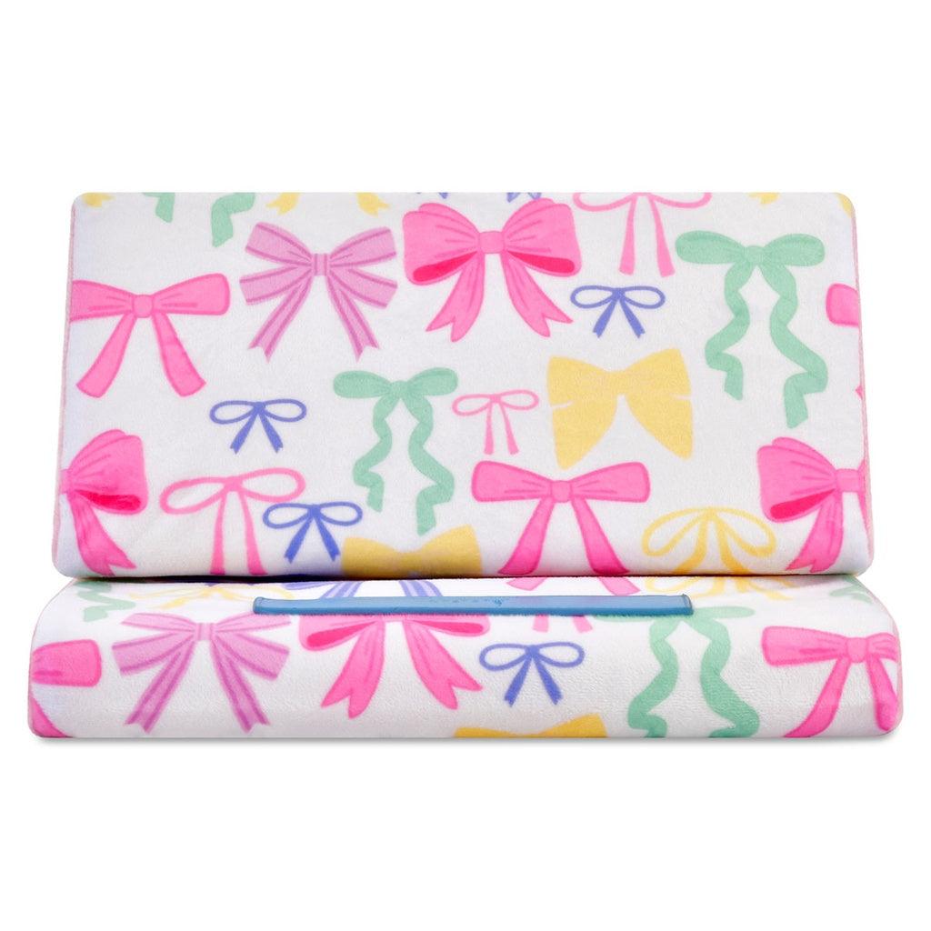 this picture shows the print head on with multi colored bows and something to lean on for a tablet or book. 