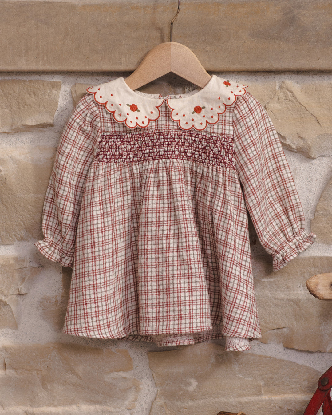 baby girl dress in plaid with creme peter pan collar with red roses on the collar 