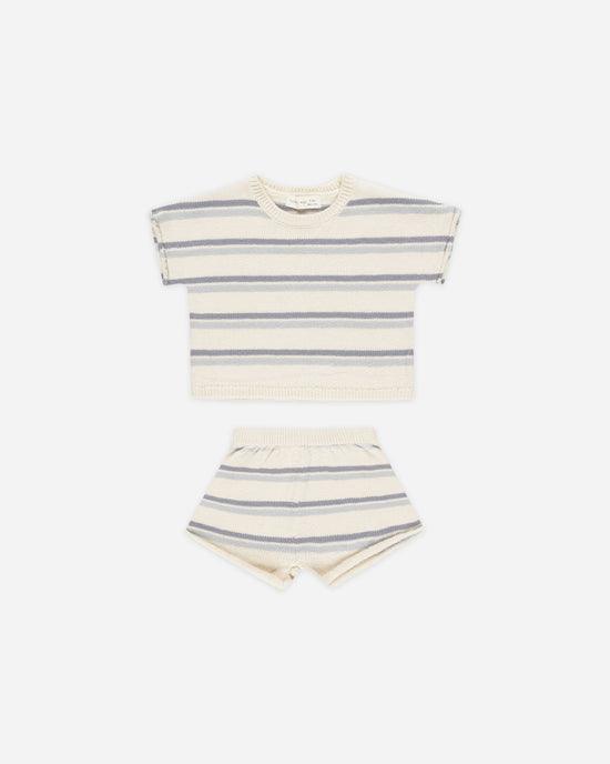 beige summer knit set with blue and gray stripes on the set. short sleeve shirt and shorts. 