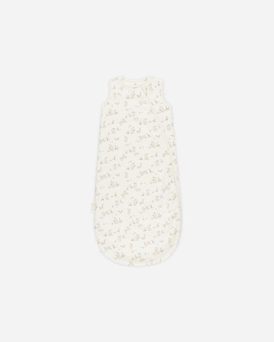 baby sleeping bag with bunnies print on it. 