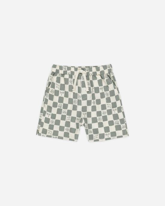 drawstring boys shorts with sage green checks and beach pictures in some of the beige checks. 