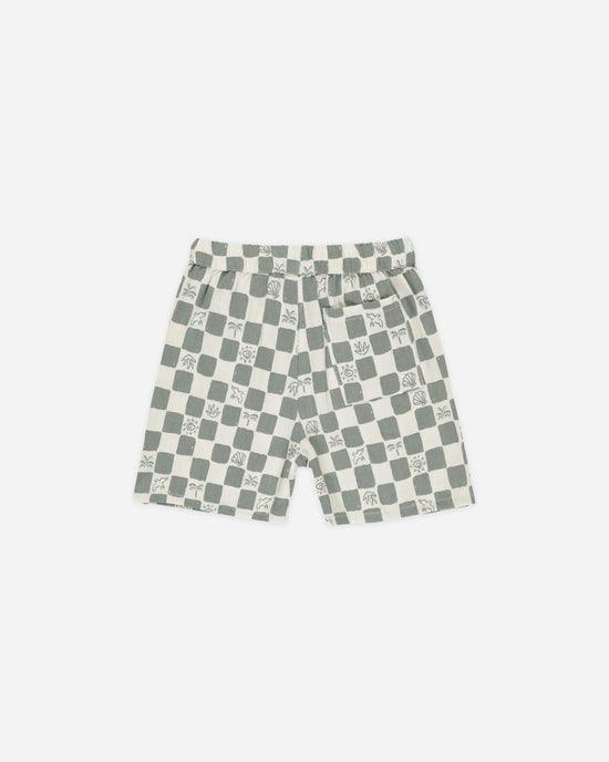 boys drawstring shorts with sage and beige checks, beach pictures in the beige check every so often. 