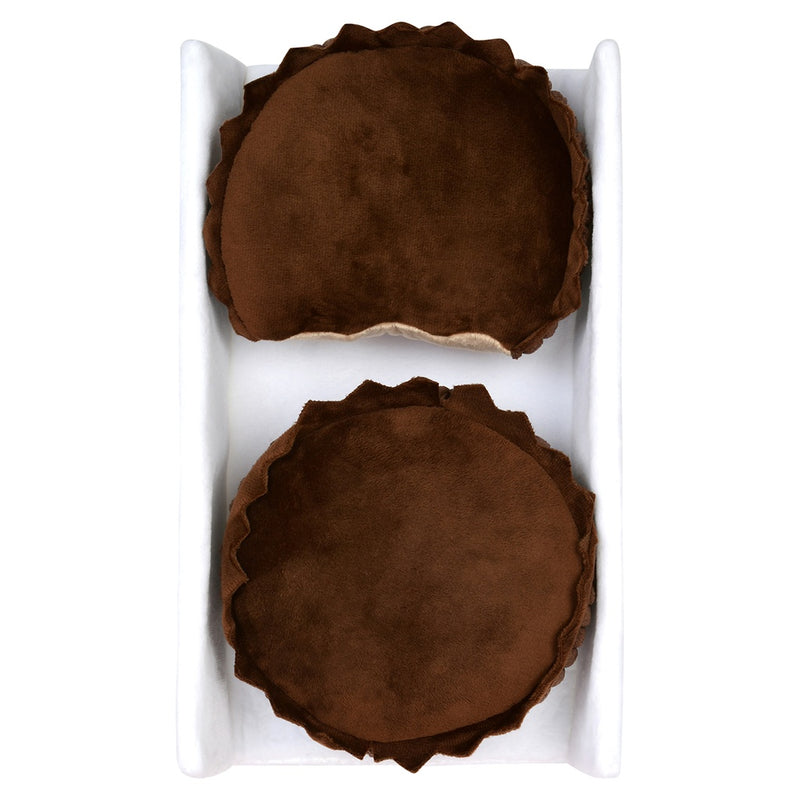 2 peanut butter cups brown in color like chocolate and one that has a bite in it. 