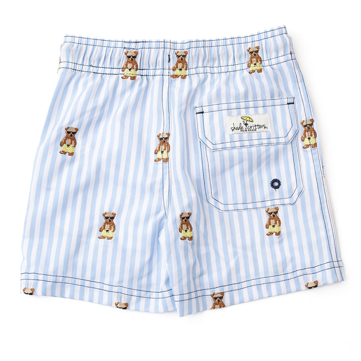 Blue and white striped shorts with teddy bear patterns on a white background