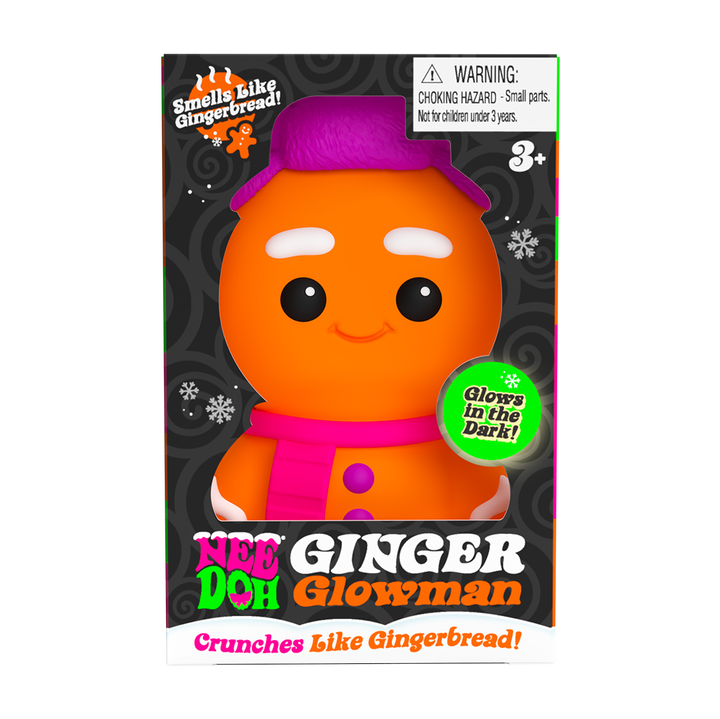 Gingerbread-themed product packaging with a character wearing a purple hat and pink scarf, featuring text and a warning label.