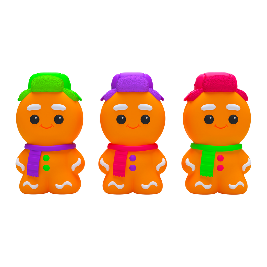 Three colorful gingerbread man figurines with hats and scarves on a white background