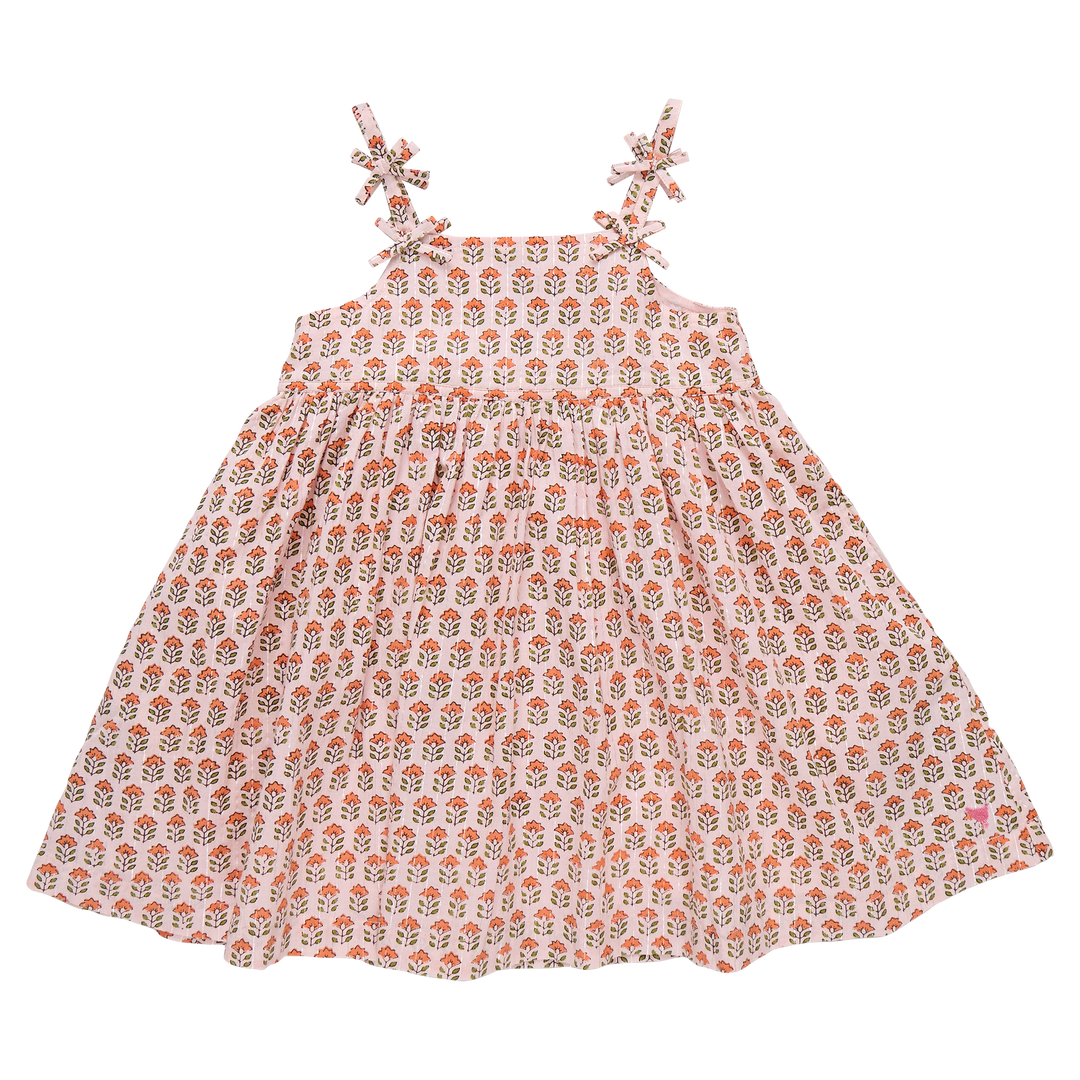Floral patterned dress on a white background