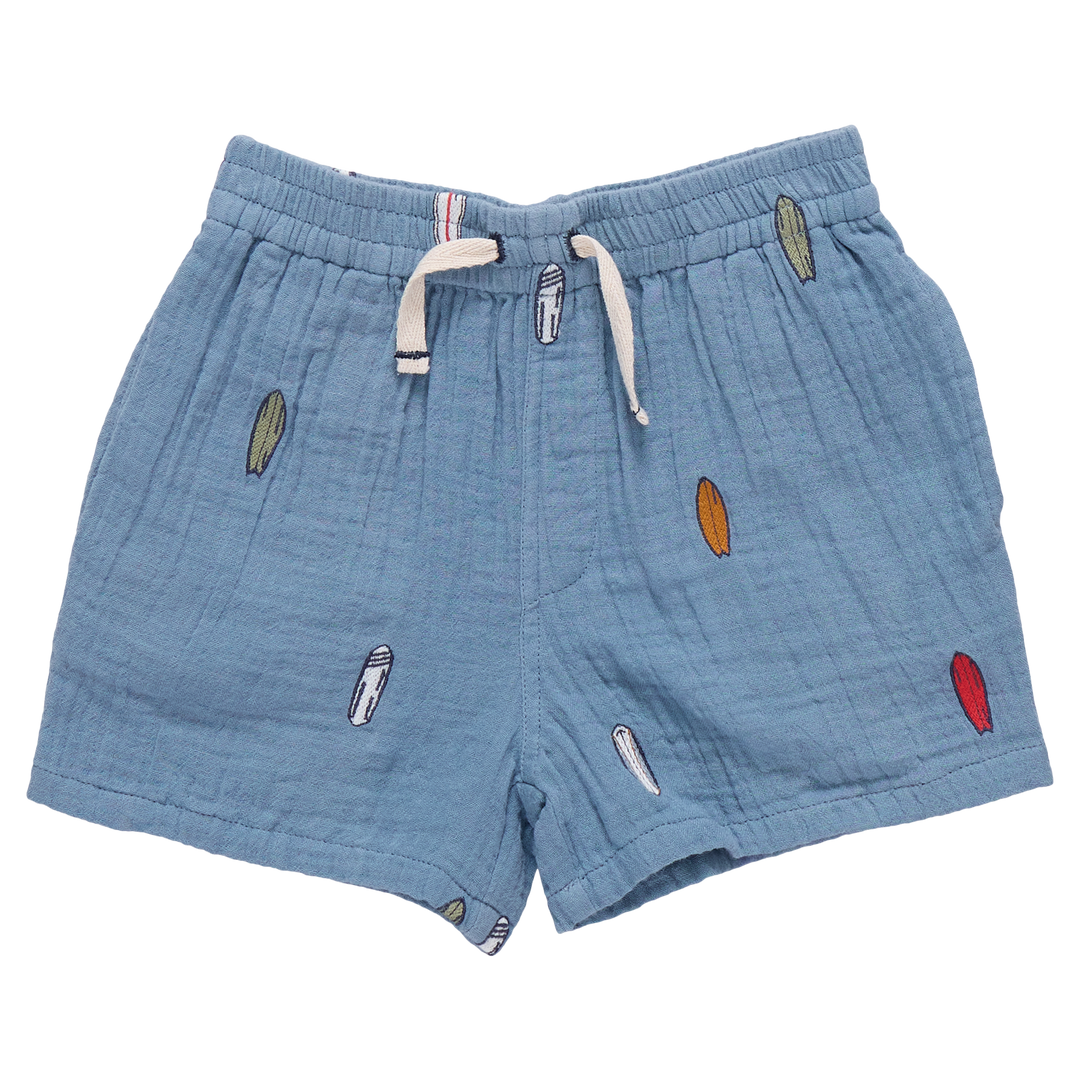 Blue shorts with colorful embroidered accents on a white background
