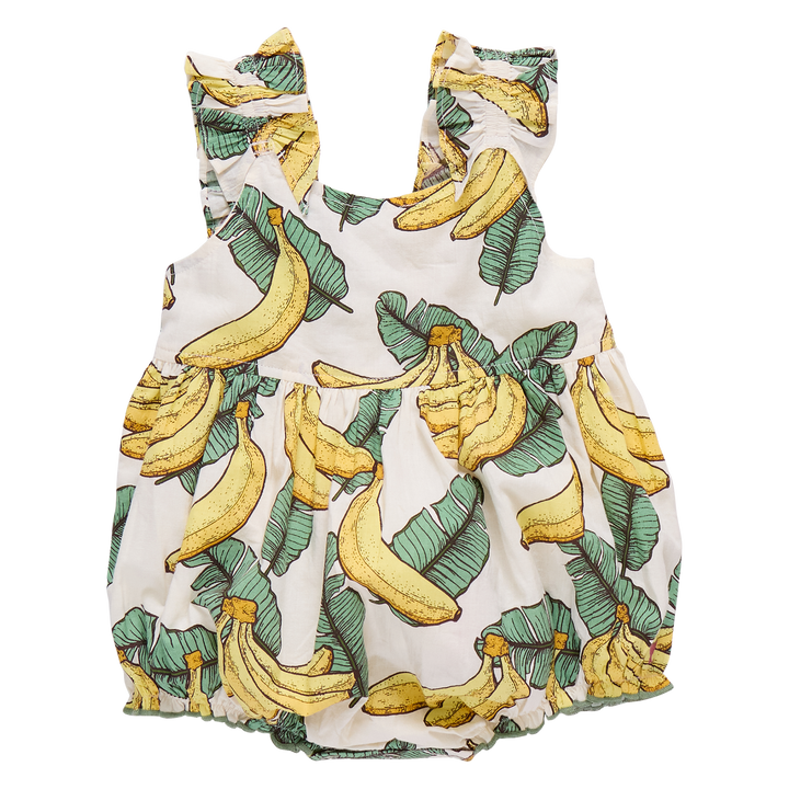 Baby romper with banana and leaf pattern on a white background