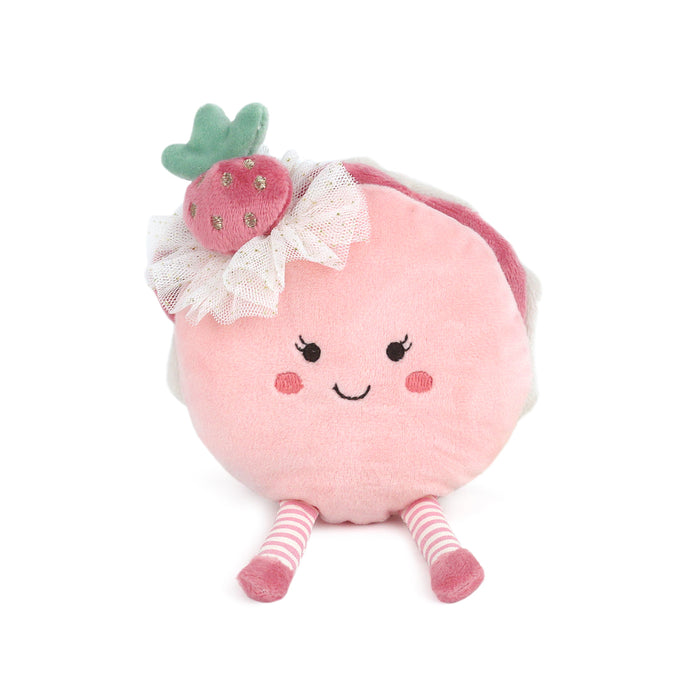 Pink plush toy with a strawberry on a white background