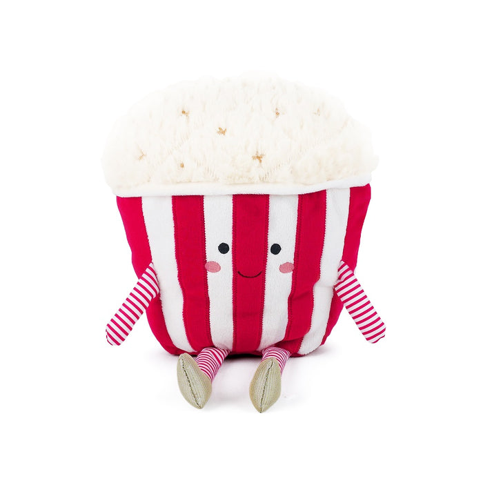 Plush toy resembling a cup of popcorn with a smiling face on a white background
