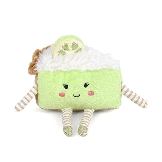 Plush toy resembling a green key lime pie slice with a face on a white background