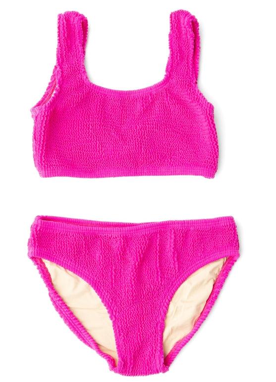 two piece bathing suit in a berry magenta color with a crinkle finish. 