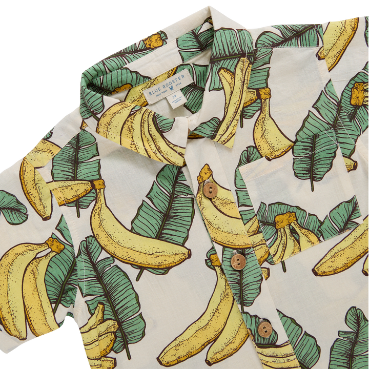 Shirt with banana and leaf pattern on a white background