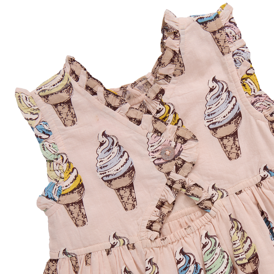 Children's dress with ice cream cone pattern on a white background