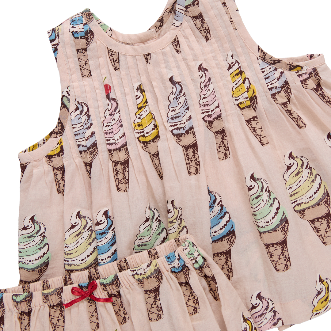 Children's dress with ice cream cone pattern on a white background