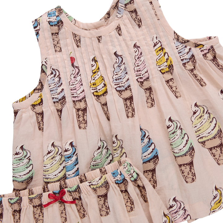 Children's dress with ice cream cone pattern on a white background