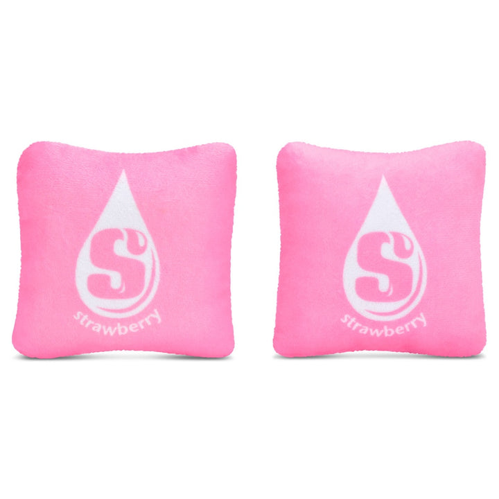 Two pink pillows with a white logo and text on a white background