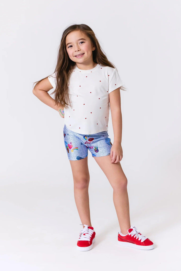 young girl modeling the shorts and top 