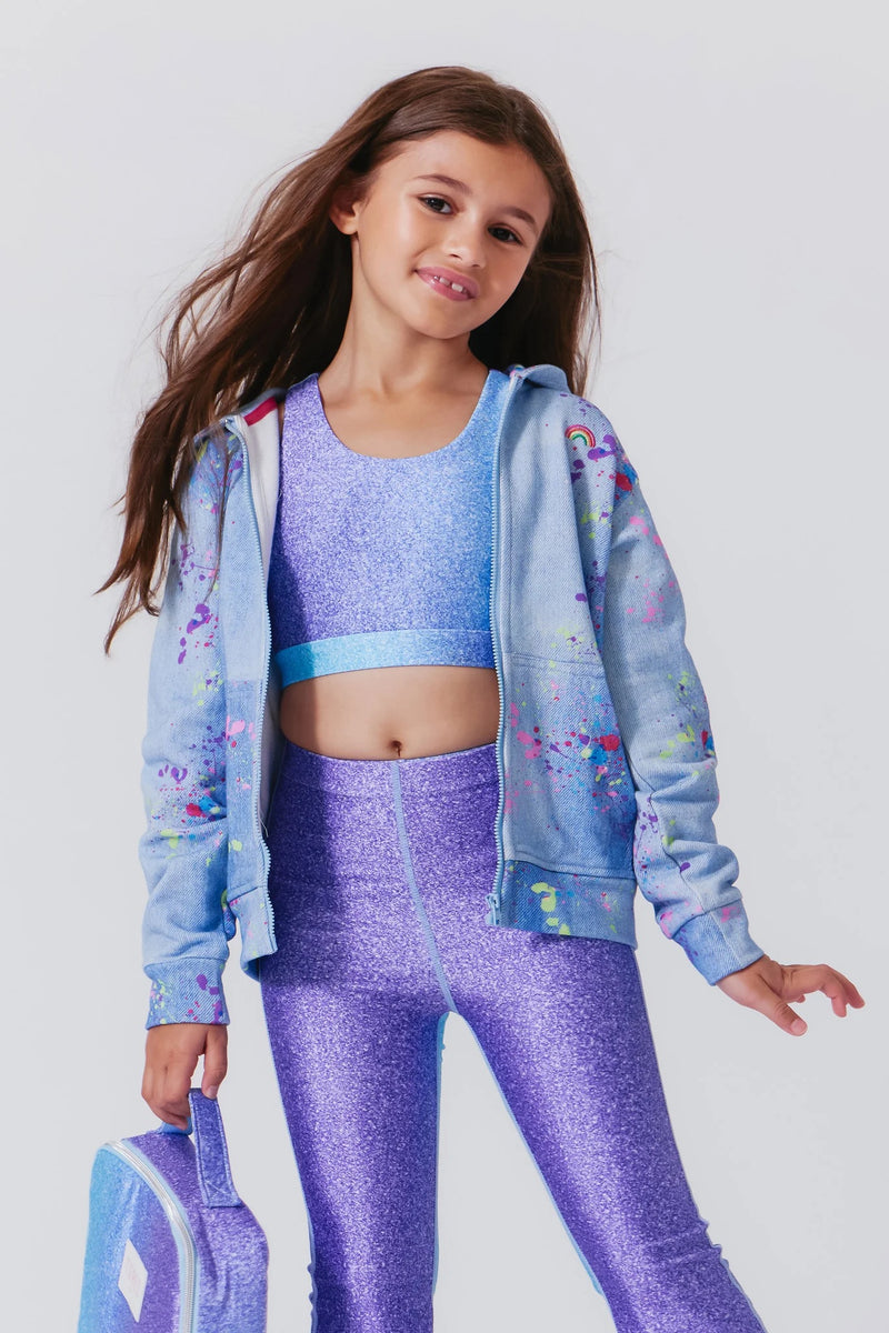 Tween Girl wearing Terez Oversized Zip Hoodie in Denim Paint Splatter Print