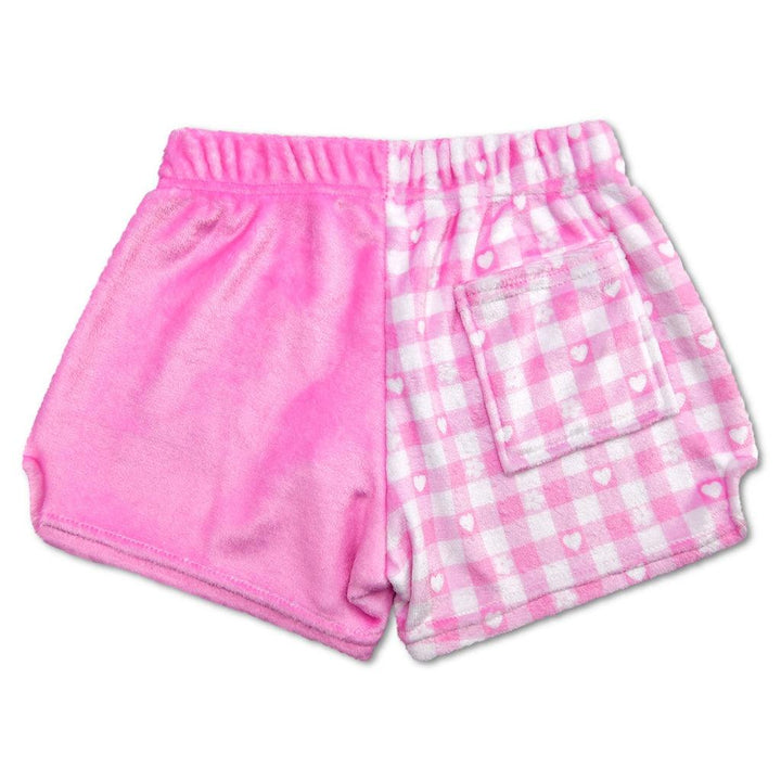 plush shorts: back of the shorts, one side of them is pink and white gingham with a pocket on the back. the other side is solid pink . 