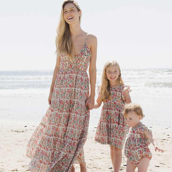 coordinating outfits for mom and two girls. all in the butterfly vines print. 