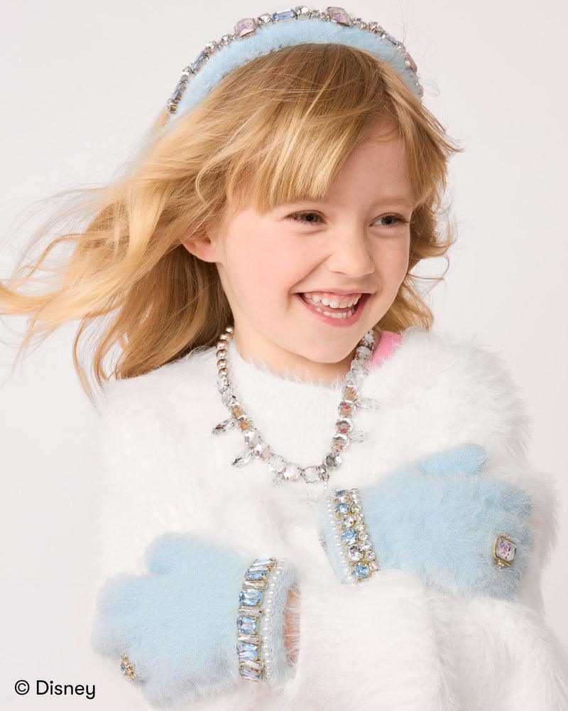 little girl modeling the elsa gloves, elsa headband and jewelery 