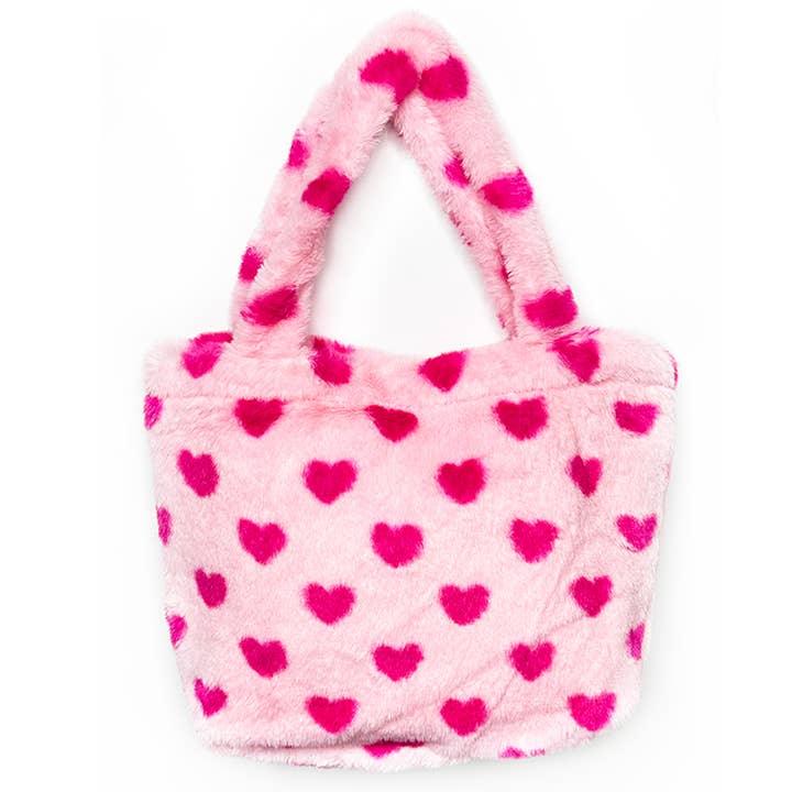 furry pink tote bag for kids with hot pink hearts all over the bag