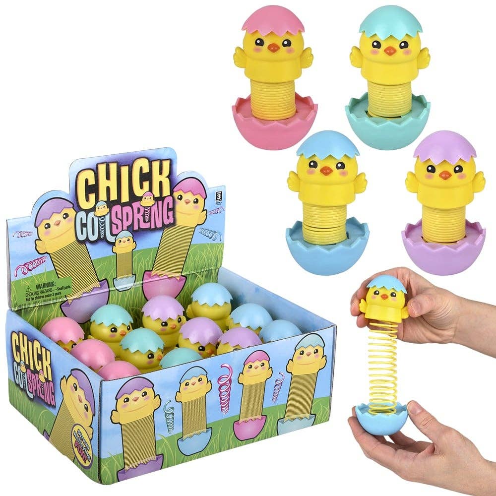 Toy chicks with springs in colorful eggs, displayed with packaging.