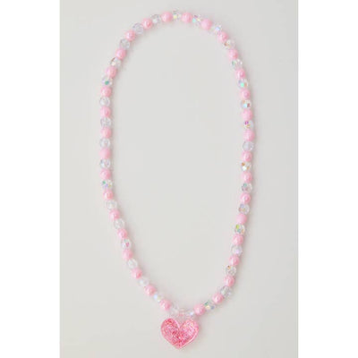 pink and clear beads strung onto an elastic necklace with a pink pendant hanging from the center. 