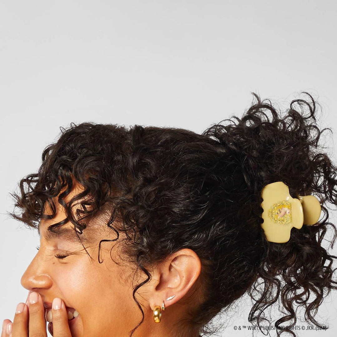 ravenclaw clip in someone's hair holding her hair up 