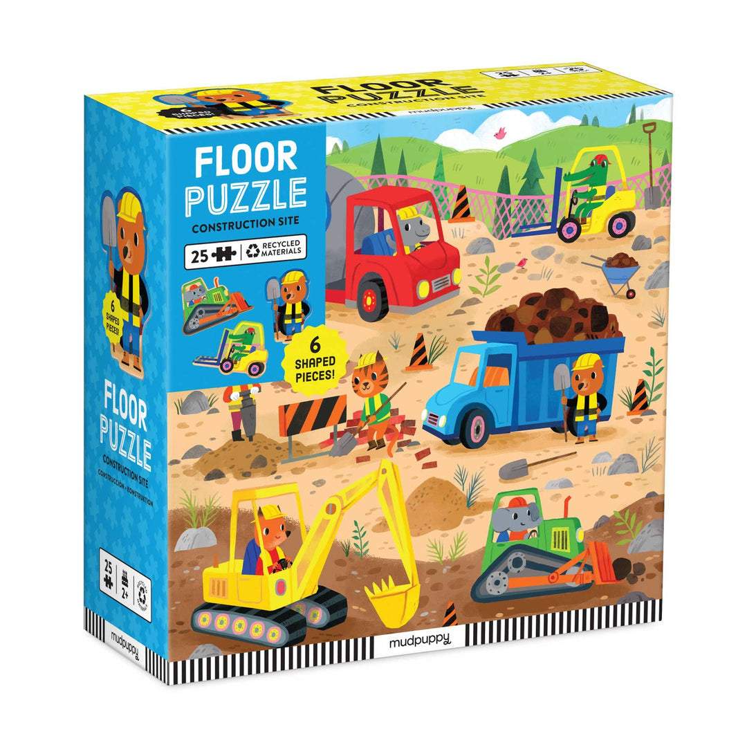 Box of a construction-themed floor puzzle for children, featuring colorful illustrations of vehicles and workers.